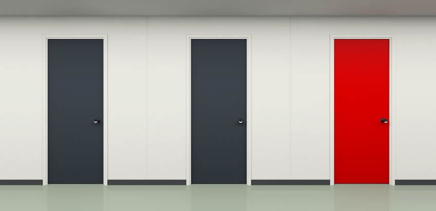 Three doors, two are grey and the last is red